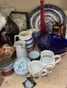 A copper lustre jug together with blue and white plates, glass vases,