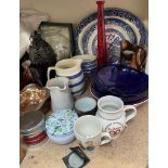 A copper lustre jug together with blue and white plates, glass vases,