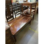 A modern yew wood coffee table with a rectangular top together with a pair of matching side tables