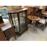 A 20th century mahogany display cabinet together with a bedside cabinet, nest of three tables,