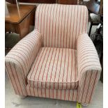 A Victorian style upholstered elbow chair with red and cream upholstery