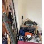 Assorted fishing equipment including rods, reels,