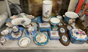 A collection of Sevres style porcelain including wall plaques, candlesticks,