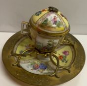 A Meissen style desk ink well, the domed lid with panels of flowers and figures to a yellow ground,