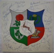 A 1980 signed British Lions to South Africa sheet with central badge signed by thirty team members