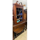 A 19th century mahogany hanging corner cupboard,