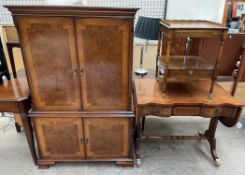 A reproduction walnut sofa table with a shaped top above three drawers on slat ends splayed legs