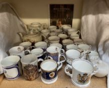 A collection of modern commemorative mugs factories including Wedgwood, Aynsley, Royal Worcester,