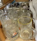 A collection of branded half pint tankards together with electroplated flatwares