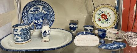 A collection of Welsh pottery, including blue and white plates, bowls, ribbon plates,