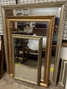 A large rectangular gilt framed wall mirror together with two other wall mirrors