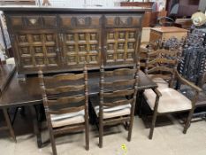 A 20th century oak dining table,