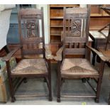 A pair of French carved elbow chairs,