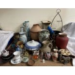 A collection of pottery vases, paperweights,