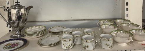 A Royal Doulton part tea set together with a Tivioli part dessert set and Limoges plate and epns