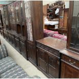 A 20th century oak dining room wall unit, comprising glazed cupboards,