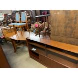 A teak bookcase with glazed doors together with a modern dining table and four chairs and a chest