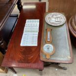 A reproduction mahogany coffee table together with a leather topped occasional table,