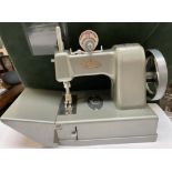 A Vulcan miniature sewing machine