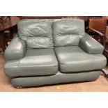 A green leather two seater settee