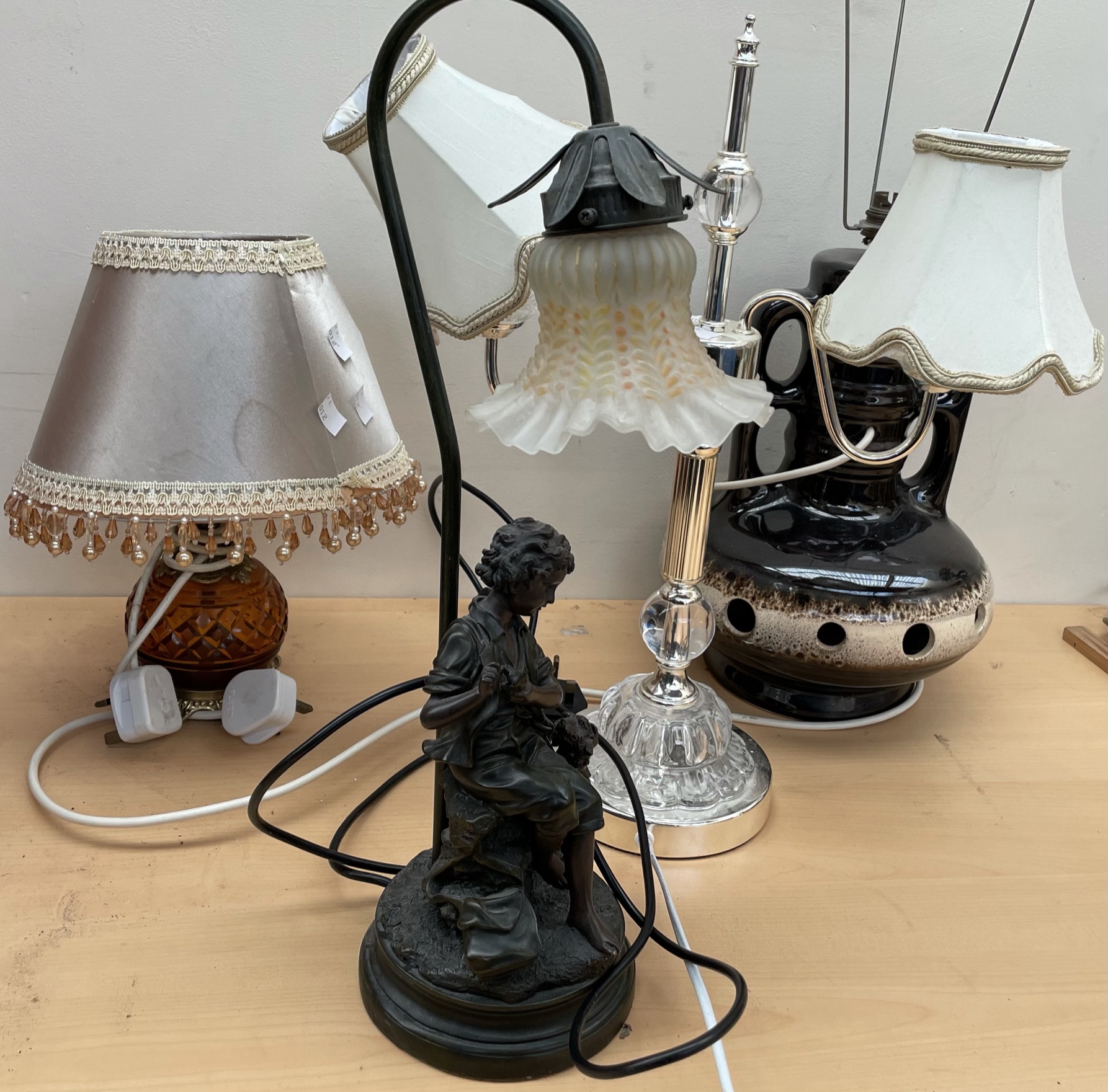 A table lamp, the figural base of a boy and his dog,
