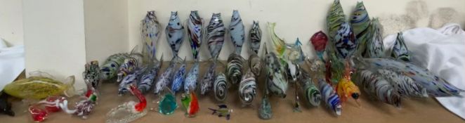 A collection of Murano style style glass fish and other glass fish