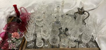 A pair of cut glass decanters together with assorted crystal glasses,