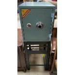 A combination and key operated safe,