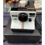 A Polaroid 1000 Land camera