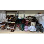 Assorted copper lustre jugs together with cow bells, pink lustre, prints,