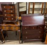 A Stag bureau together with a reproduction mahogany side table on leaf capped cabriole legs and pad