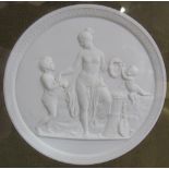 A pair of parian plaques depicting an angel,