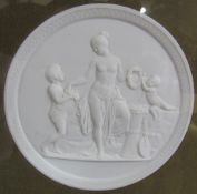 A pair of parian plaques depicting an angel,