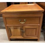 A Chinese hardwood side cabinet with a square top,