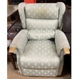An upholstered electric chair (Sold as seen,