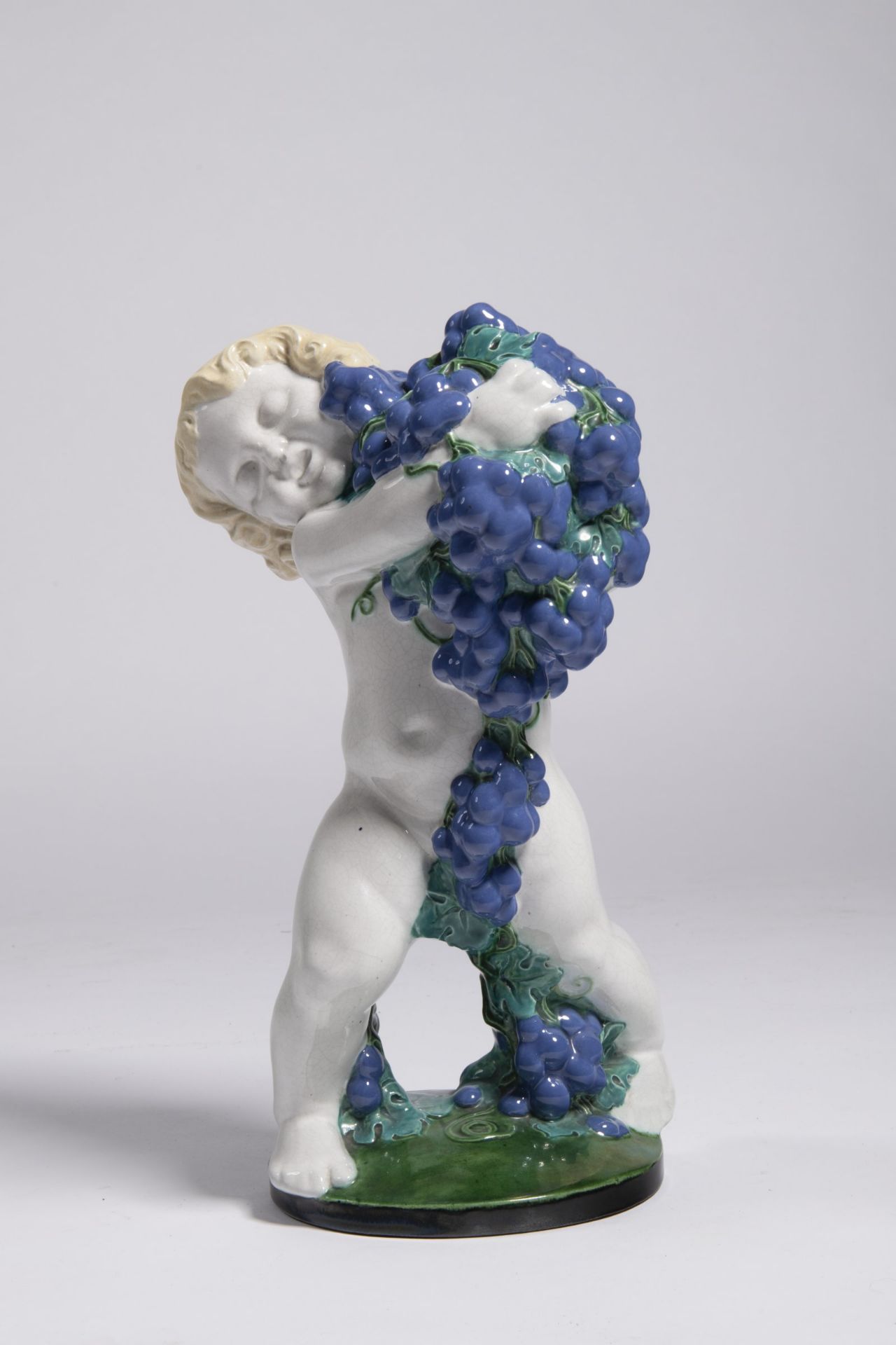 MICHAEL POWOLNY 1871 - 1954: PUTTO WITH BLUE GRAPES - AUTUMN 1907 Austria Glazed pottery 38 cm Art - Bild 2 aus 2