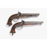 PAIRED TWO SHOT PERCUSSION PISTOLS Around the mid-19th century Central Europe Steel, walnut wood