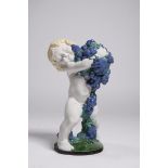MICHAEL POWOLNY 1871 - 1954: PUTTO WITH BLUE GRAPES - AUTUMN 1907 Austria Glazed pottery 38 cm Art