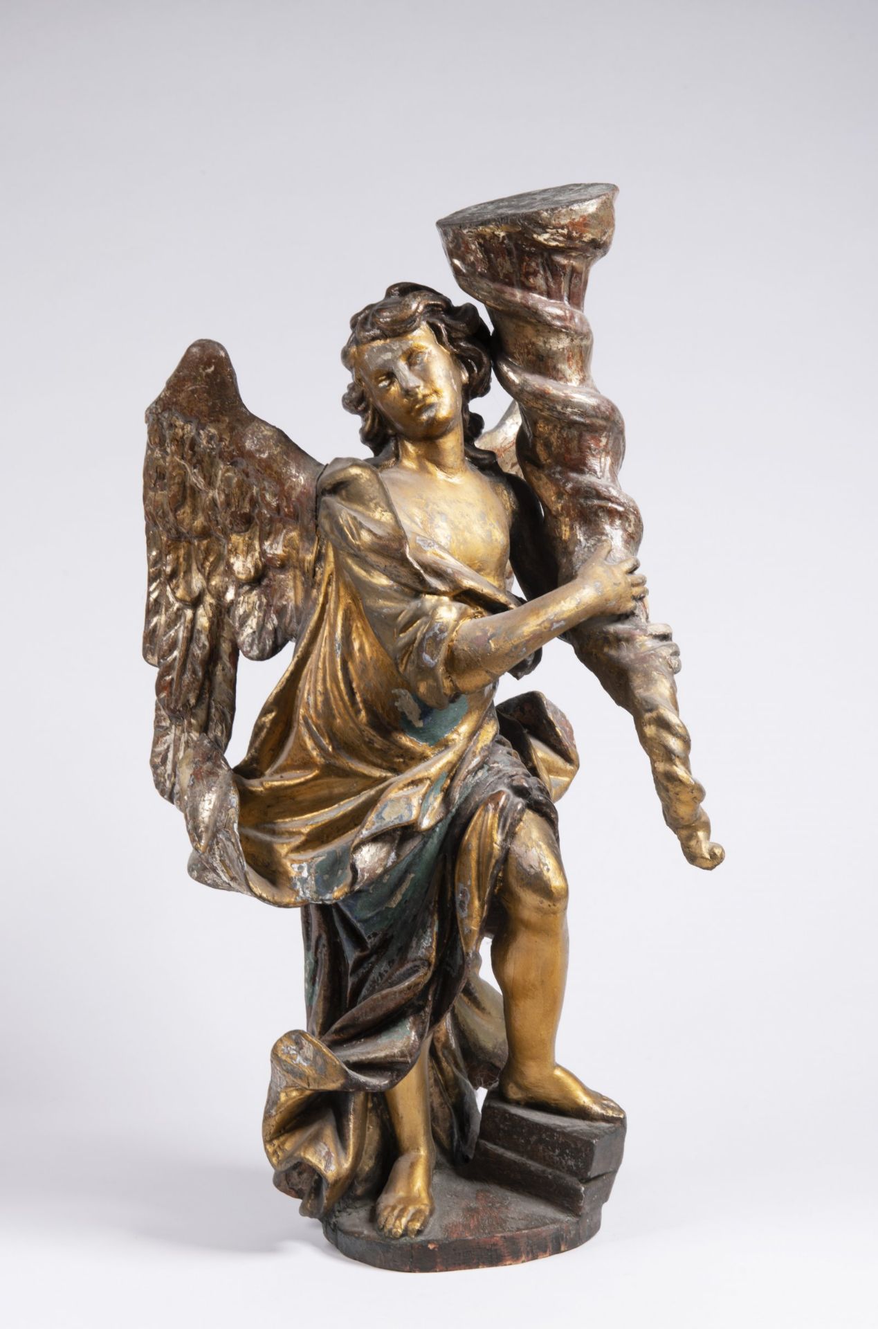 ANGEL - TORCHBEARER 18th century Central Europe Polychrome and gilded wood 58 cm A tall statuette of