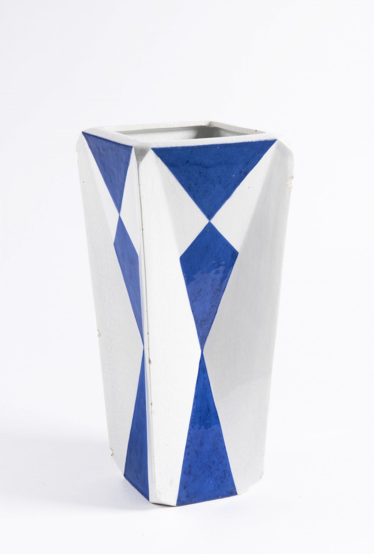 VLASTISLAV HOFMAN 1884 - 1964: A CUBIST VASE 1914 Soft stoneware, white glaze, blue decor 33,5 cm