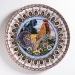 ALOIS JARONĚK 1870 - 1944: PAIRED DECORATIVE WALL PLATES Ca. 1910 Polychrome wood ⌀40 cm Alois