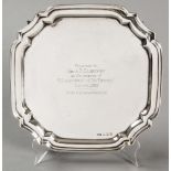 A 20th CENTURY SILVER SALVER, SHEFFIELD 1963, E.V., wavy rim and border, the well engraved with a