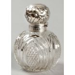 AN EDWARDIAN SILVER AND CUTGLASS PERFUME BOTTLE, SHEFFIELD 1902, JAMES DIXON & SON, the hinged top