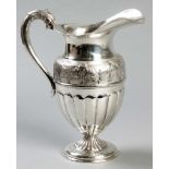 A MEXICAN SILVER WATER JUG BY CAYETANO BUITRON, fold-over rim, the body embossed and pin-prick