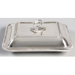 A SILVERPLATE ENTRÉE DISH, the cover with a removable scroll and beaded handle, gadrooned border,