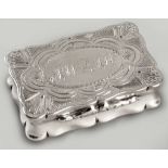 AN EDWARDIAN SILVER PILL BOX, BIRMINGHAM 1903, J.G., the hinged cover with pinprick engravings and