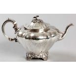 A VICTORIAN SILVER TEAPOT, SHEFFIELD 1863, HAWKESWORTH, EYRE & CO., a hinged cover with removable
