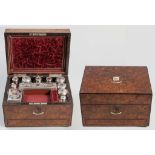 A VICTORIAN WALNUT TRAVELLING VANITY CASE, LONDON 1859, THOMAS WHIPMAN, comprising eleven silver top