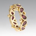 Garnet Eternity Band in 18k Gold