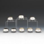 Eight Sterling Silver Salt Cellars by Various Makers